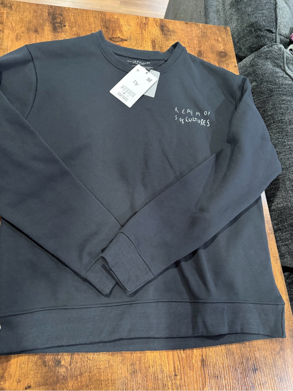 Denim & Flower Black Crewneck Sweatshirt with White Chest Script